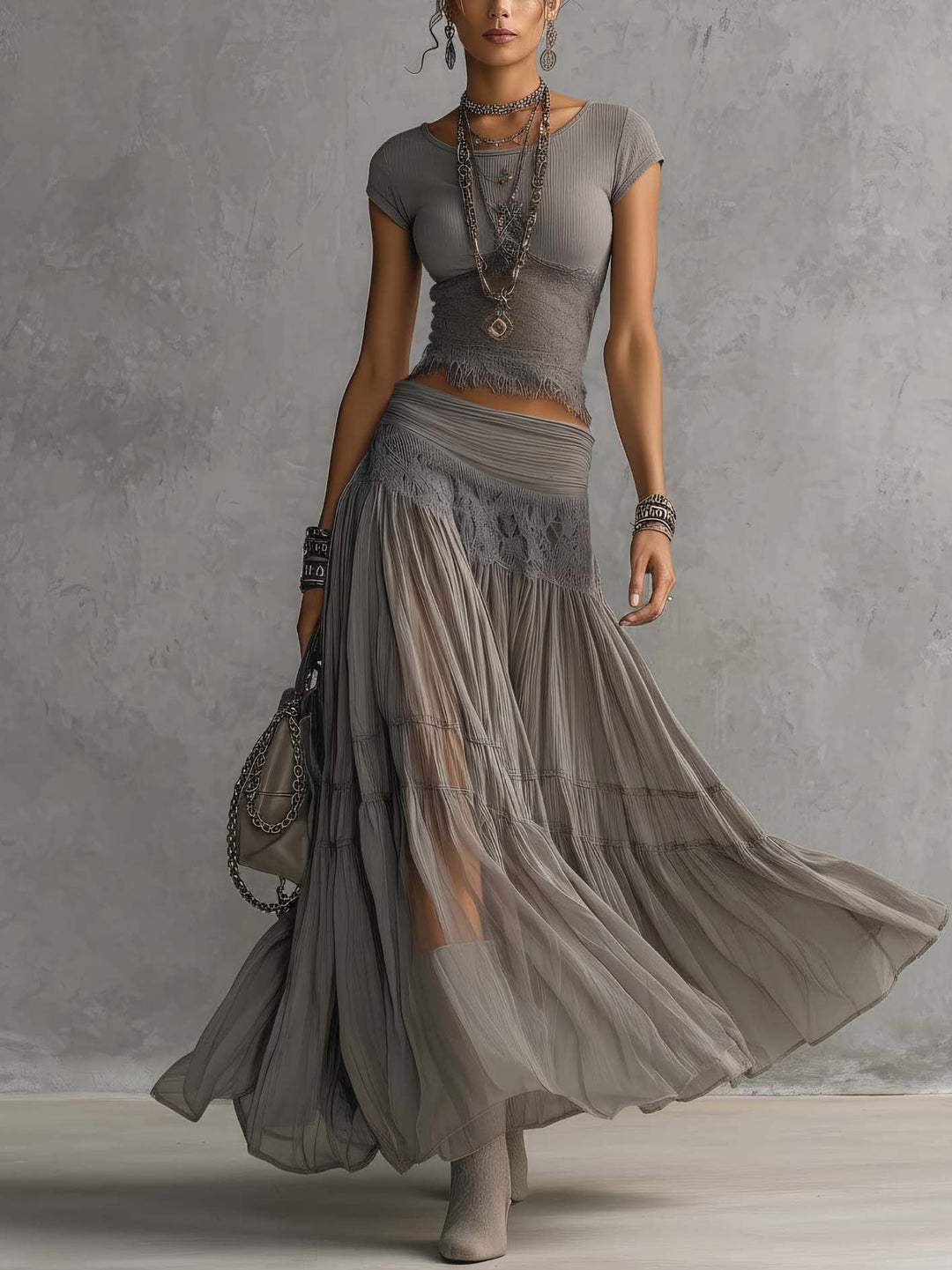Completo Geneviève — transparenter Top mit plissierter Rock