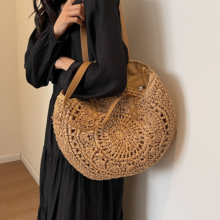 Lola | Runde Tasche aus geflochtener Stroh mit Muster — Cognac