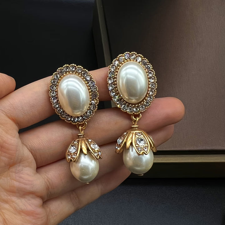 Ohrringe mit Vintage-Rahmen aus Perlen