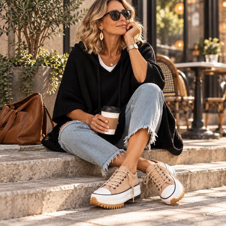 Oriana | Poncho in maglia con cappuccio e manica a tre quarti