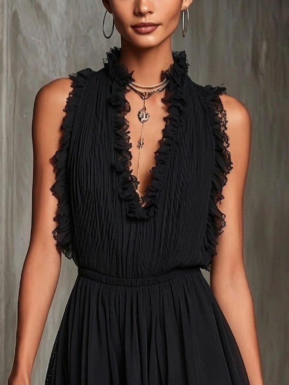 Schwarzer plissierter Chiffon-Overall mit Rüschensaum