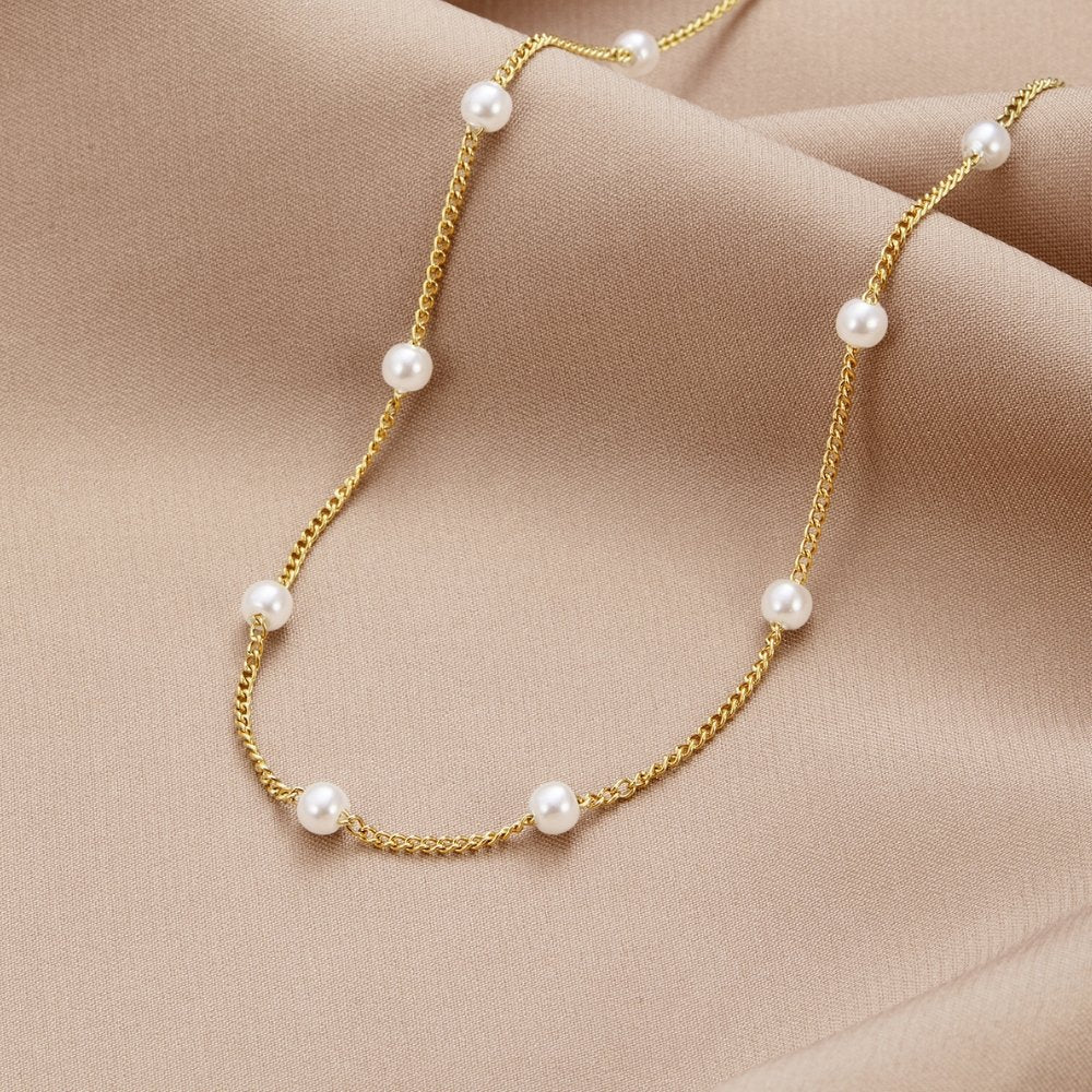 Zeitlose Goldperlenkette