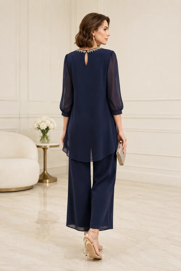 Gestuftes Chiffon-Jumpsuit mit Perlen und Dreiviertelärmeln
