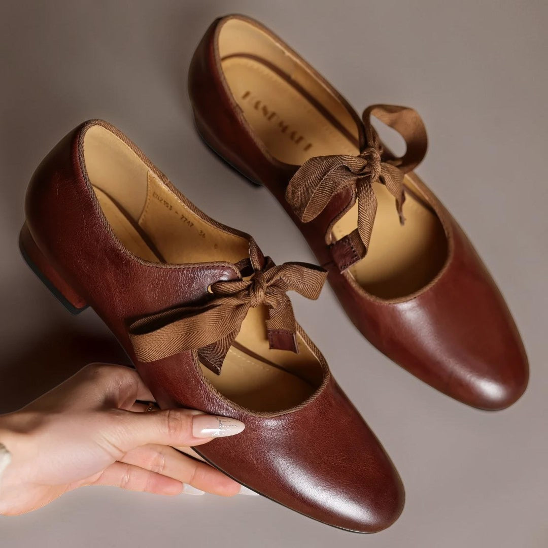 Ballerinas in Lederoptik mit Schleife Sophie